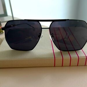 2 pairs of Sunglasses